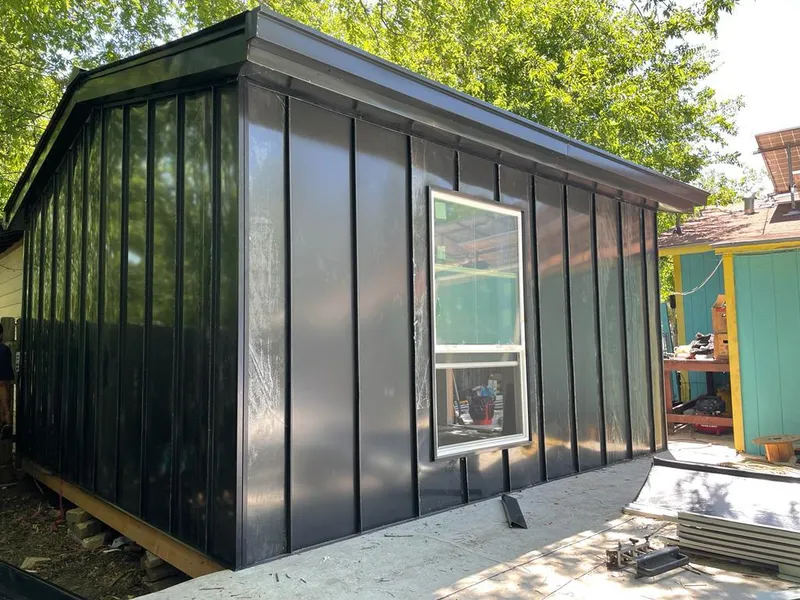 Black standing seam metal wall panels for Metal Roof Installation in Hamlet