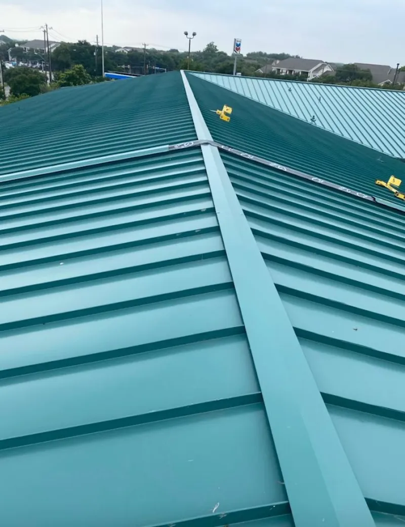 Green commercial metal roof ridge and valley for Metal Roof Repair in Hamlet