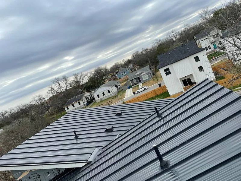 Standing seam metal roof panels with vents for Skylight Repair in Hamlet